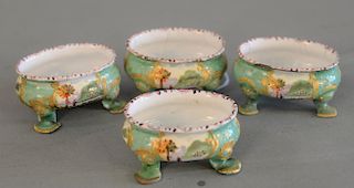 Set of four south Staffordshire enamel salts having green ground oval pad footed, each decorated with figures in landscapes, circa 1...