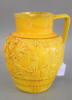 Minton majolica yellow ground jug molded with hunters and hounds, late 19th century, impressed uppercase mark. ht. 8 1/2 in.