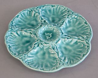 Set of twelve French (Gien) faience fine turquoise glazed oyster plates, black printed marks. dia. 9 3/4 in.