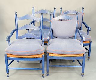 Set of four country arm chairs painted blue with rush seats.
