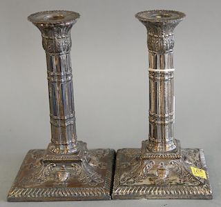 Pair of Sheffield silver plated candlesticks each with gadrooned border on square foot. ht. 7 1/4 in.