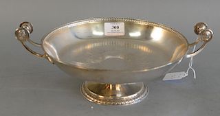 American silver compote on pedestal foot with two open work medallion handles, engraved initial and cartouche, mark of Gorham mfg. c...