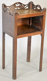 George III mahogany pot stand with pierced fret three- quarter gallery. ht. 31 in., wd. 16 in., dp. 12 in.