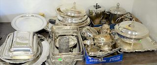 Large group of silver plate to include serving trays, ice buckets, tureens, etc.