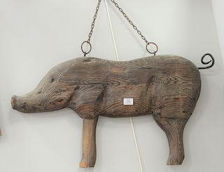 Pig wooden store sign with iron tail. ht. 17 1/4 in., lg. 32 1/2 in.
