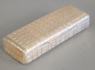 Tiffany and Company sterling silver box with hinged lid and gold washed interior. dia. 1", top: 1 1/2" x 4 1/4". 4.2 t.oz.