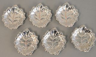 Set of six English silver plated leaf form dishes, 20th century. ht. 1/2 in., wd. 3 1/4 in. 9.3 t.oz