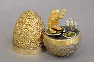 Stuart Devlin, Elizabeth II silver gilt model of an easter egg, mark of Stuart Devlin, London, circa 1960, opening to enameled frog o...