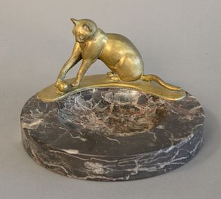 Karl Heynen-Dumont cat bowl having bronze cat playing with a ball on the edge of the granite bowl.