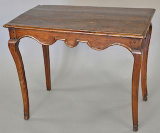 French Louis XV provincial walnut side table with rectangular top and hoot fee, 18th / 19th century. ht. 24 in., wd. 30 in., dp. 18 in.