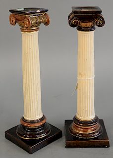 Pair of majolica vitruvian column form candlesticks, impressed model number 4455. ht. 10 1/2 in .