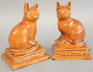 Pair of brown glazed pottery cat figures, DM+P Manheim label. ht. 7 1/2 in.