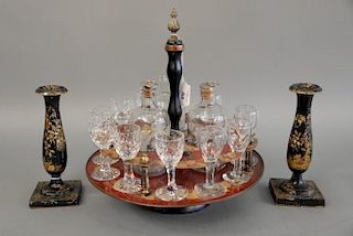 A regency gilt and red lacquered drinks stand, holding glasses and two decanters, early 19th century. ht. 13in., dia. 11 1/2 in. alo...