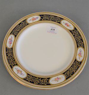 Set of eleven Burley porcelain blue ground dinner plates with raised gold, dia. 10 1/4 in.