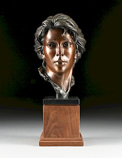 GEORGE W. LUNDEEN (American b. 1948) A SCULPTURE, "Bust of a Young Woman," 1988,