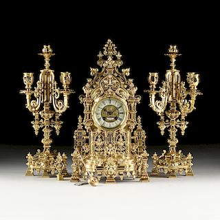 A FRENCH JAPY FRERES WORKS GOTHIC REVIVAL GILT BRASS THREE PIECE GARNITURE, NAPOLEON III (1852-1873),