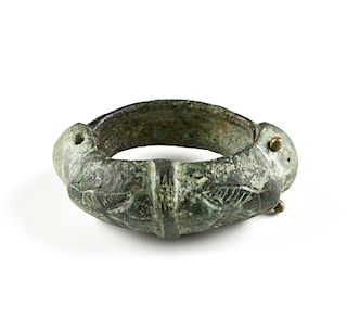 AN ANCIENT NEAR EAST STYLE BRONZE OWL BRACELET, ATTRIBUTED TO LURISTAN, POSSIBLY 8TH-4TH CENTURY BC,