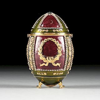 A VIVIAN ALEXANDER RHINESTONE INLAID AND ENAMELED GILT METAL EGG PURSE, LABELED AND NUMBERED,