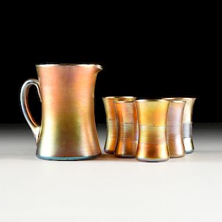 AN ASSEMBLED SIX PIECE LOUIS COMFORT TIFFANY FAVRILE GLASS PITCHER AND TUMBLER SET, ENGRAVED SIGNATURE, EARLY 20TH CENTURY,