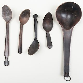 Group of Four African Wooden Spoons and an Indonesian Ladle