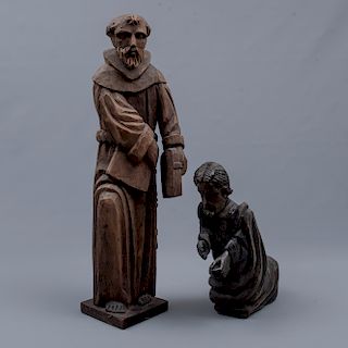Lote de 2 esculturas religiosas. San José y San Francisco de Asís. Siglo XX. En talla de madera. Dimensiones: 60 x 16 x 19 cm. (mayor)