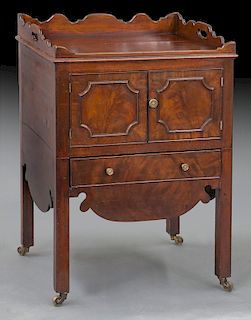 Georgian mahogany bedside cabinet with shaped