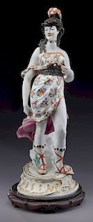 Large antique porcelain figure of a standing lady