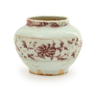 A Chinese Copper-Red Decorated Porcelain Waterpot
Height 2 1/2 in., 6 cm.