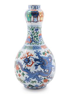 A Chinese Wucai Porcelain Bottle
Height 10 1/4 in., 26 cm.