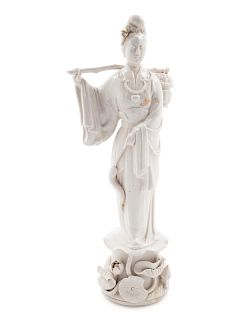 A Chinese Blanc-de-Chine Porcelain Figure
Height: 13 1/4 in., 34 cm. 