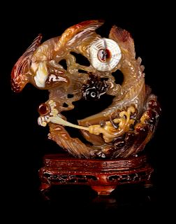 A Chinese Carnelian Agate Carving
Height 5 1/2 in., 14 cm. 