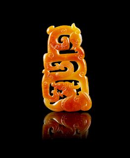 A Chinese Russet and White Jade Reticulated Pendant
Height 2 5/8 in., 7 cm. 