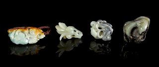 Four Chinese Carved Jade and Jadeite Toggles
Largest: height 2 1/4 in., 5.7 cm. 