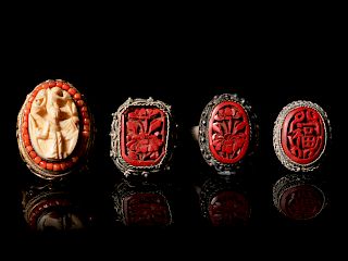 Four Chinese Red Lacquer Inset Silver Rings
Largest inset: length 1 1/4 in. 3 cm. 