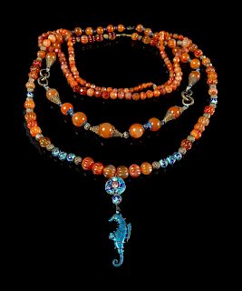 Three Chinese Carnelian Agate Necklaces
Longest: length 19 1/4 in., 49 cm. 