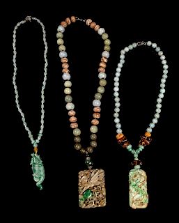 Three Chinese Jade, Jadeite and Hardstone Beaded Necklaces
Largest: length 15 1/2 in., 39 cm.