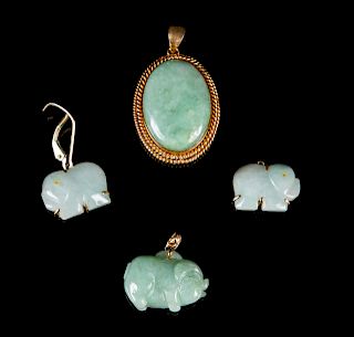 Four Chinese 14K Yellow Gold Mounted Jadeite Pendants
Largest: width 1 1/4 in., 3 cm.