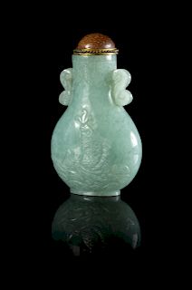 A Chinese Celadon Jadeite Snuff Bottle
Height 2 1/2 in., 6 cm. 
