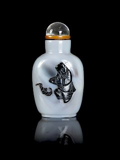 A Chinese Carved Agate Snuff Bottle
Height 2 1/2 in., 6 cm. 