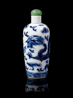 A Chinese Blue and White Porcelain Snuff Bottle
Height 3 1/4 in., 8 cm. 