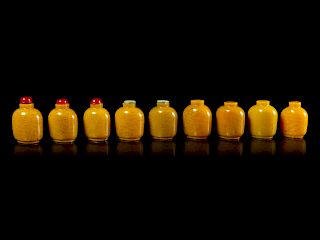 Nine Chinese Yellow Glass Snuff Bottles
Each: height 2 3/8 in., 6 cm. 
