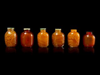 Six Chinese Russet Glass Snuff Bottles
Tallest: height 2 1/2 in., 6 cm.