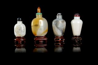 Four Chinese Peking Glass Snuff BottlesLargest: height 2 3/8 in., 6 cm.