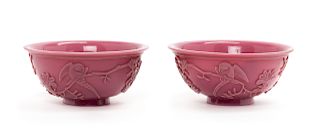 A Pair of Chinese Mauve Peking Glass Bowls
Each: diam 6 3/4 in., 17 cm. 