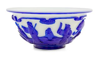 A Chinese Sapphire-Blue Overlay White Peking Glass Bowl
Diam 6 1/2 in., 17 cm.