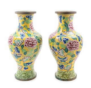 A Pair of Chinese Canton Enamel on Copper Vases
Height 18 1/2 in., 47 cm. 