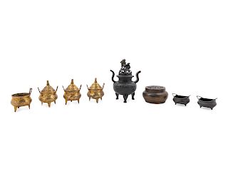 Seven Chinese Metal Incense Burners and One Bronze Circular Hand Warmer
Tallest: height 8 1/4 in., 21 cm.
