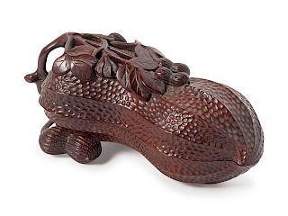 A Chinese Rosewood Peanut-form Covered Box
Length 8 3/4 in., 22 cm.