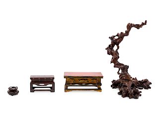 Four Chinese Hardwood Stands
Largest: height 13 in., 33 cm. 