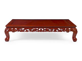A Large Chinese Rosewood Coffee Table
Height 14 1/4 x length 60 x depth 37 in., 36 x 152 x 94 cm/